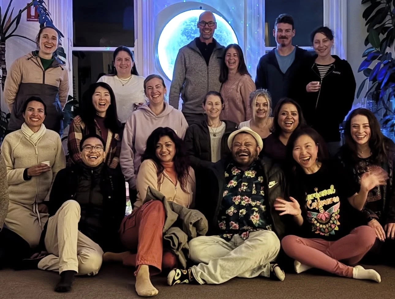 Community wellness gathering with food music and acoustic healing at Mystic Wellness