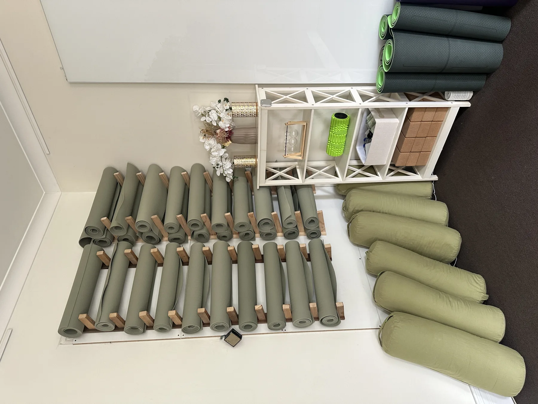 Studio rental yoga mats and props ready for facilitators at Mystic Wellness Petersham